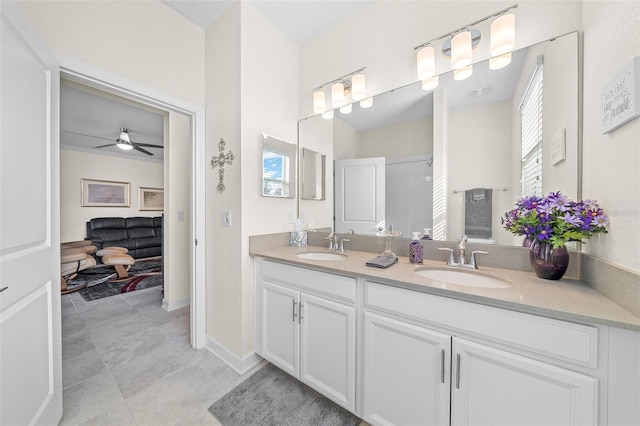 bathroom with ceiling fan and vanity