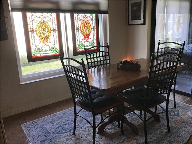 view of tiled dining space