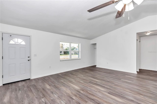 entryway with dark hardwood / wood-style flooring, ceiling fan, and lofted ceiling