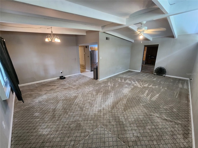 interior space with carpet flooring, ceiling fan with notable chandelier, and stainless steel refrigerator