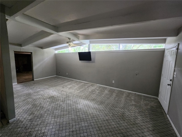 bonus room with a healthy amount of sunlight, carpet, lofted ceiling with beams, and ceiling fan