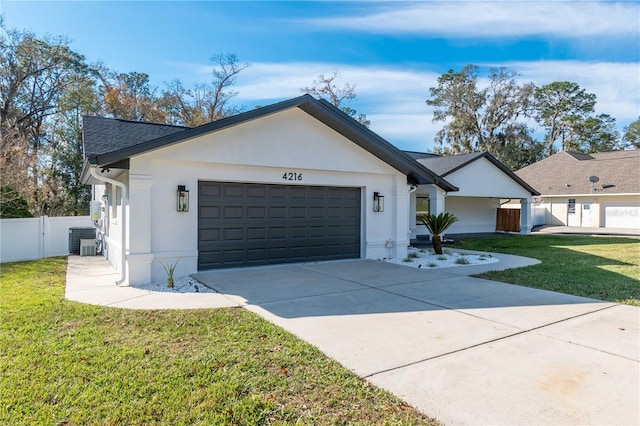 ranch-style house featuring a garage, central air condition unit, and a front lawn