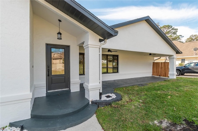 doorway to property featuring a yard