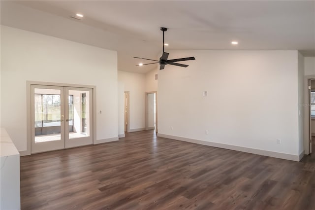 unfurnished living room with ceiling fan, dark hardwood / wood-style flooring, high vaulted ceiling, and french doors