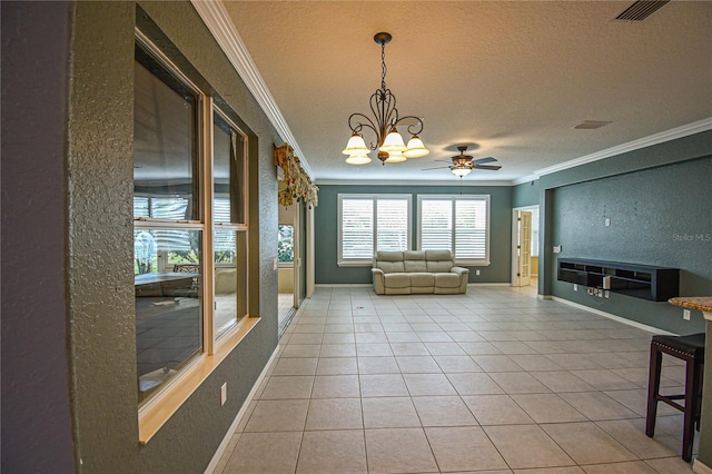 interior space with ceiling fan with notable chandelier