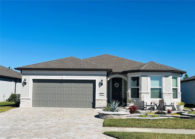 view of front of home featuring a garage