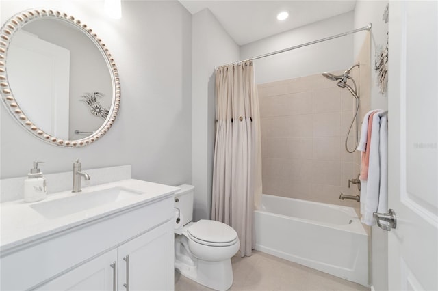 full bathroom featuring shower / bath combo, vanity, and toilet