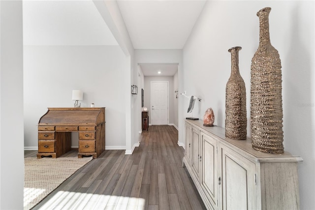 hall featuring dark wood-type flooring