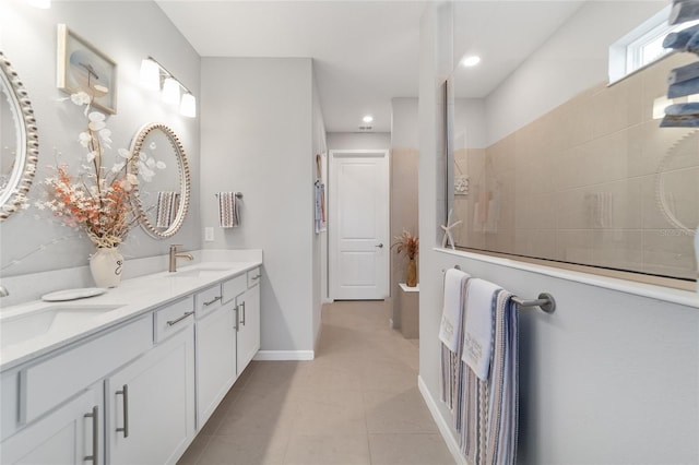 bathroom with vanity and tile patterned floors