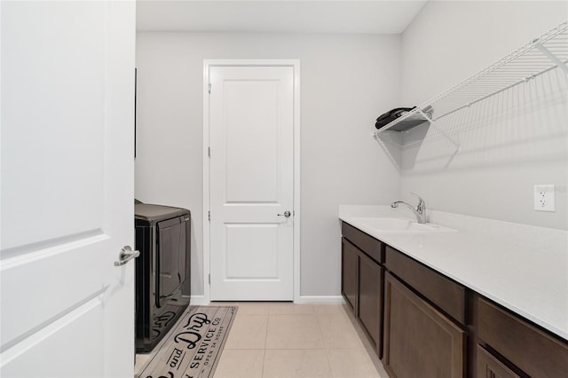 bathroom featuring tile patterned floors and vanity