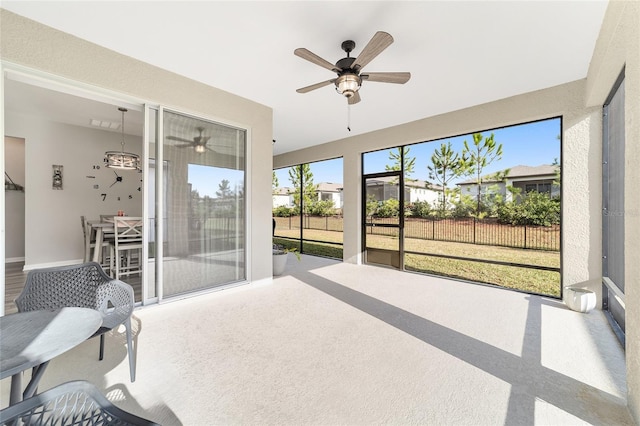 sunroom / solarium with ceiling fan