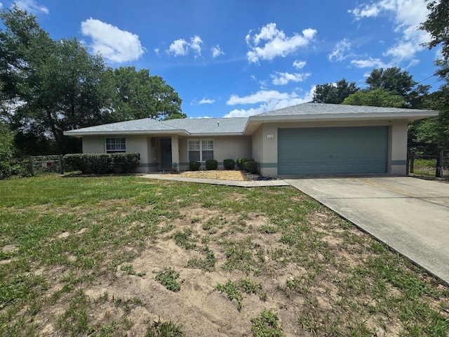 113 Guava Ter, Ocklawaha, FL 32179 - single story home featuring stucco siding, a garage, and concrete driveway