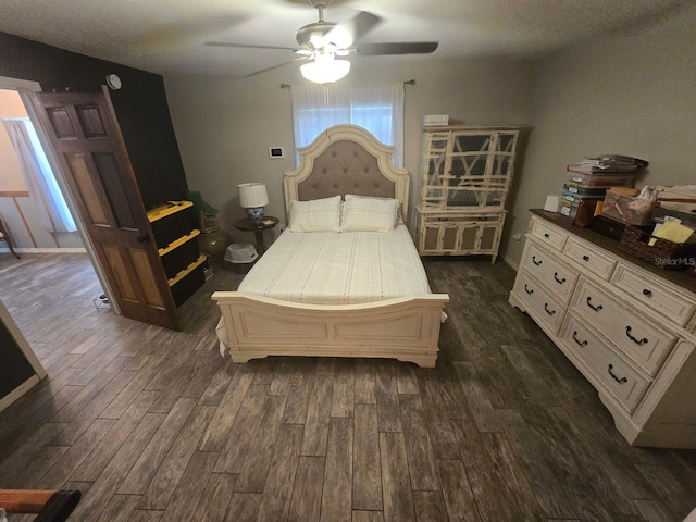 113 Guava Ter, Ocklawaha, FL 32179 - bedroom featuring dark wood finished floors and ceiling fan