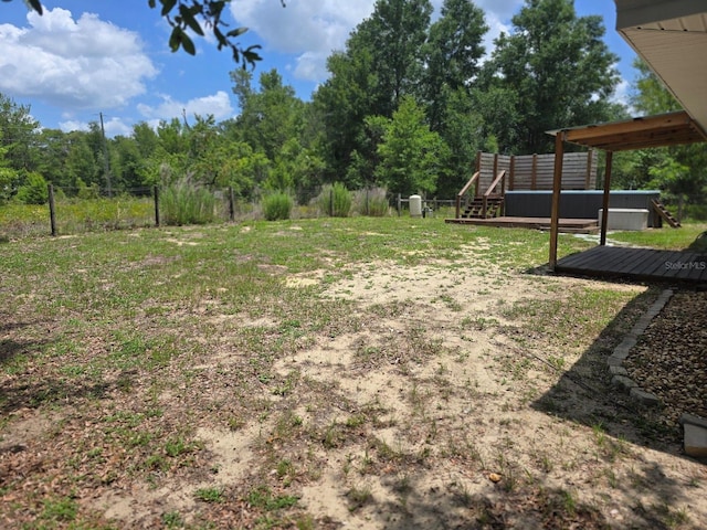 113 Guava Ter, Ocklawaha, FL 32179 - view of yard with a wooden deck
