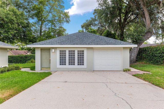 garage featuring a yard