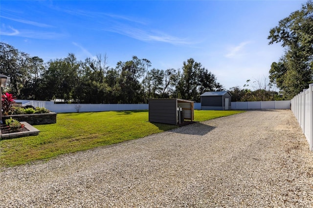 view of yard with a storage shed