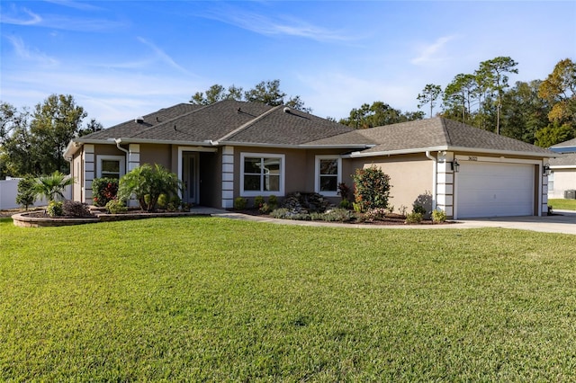 ranch-style house with a garage and a front lawn