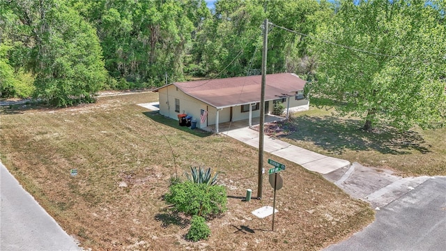 5507 SE 107th Pl, Belleview, FL 34420 - aerial view featuring a view of trees