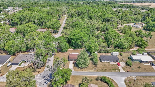 5507 SE 107th Pl, Belleview, FL 34420 - bird's eye view with a wooded view