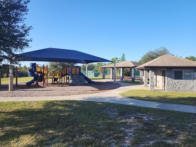 view of jungle gym featuring a yard