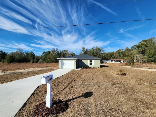 single story home featuring a garage