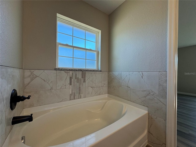 bathroom featuring a bathtub