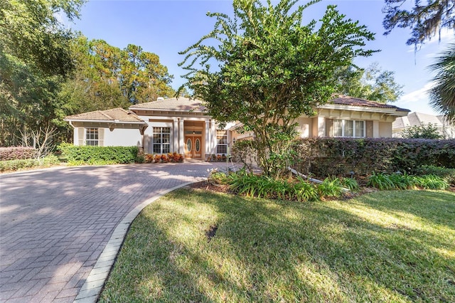 view of front of home with a front yard