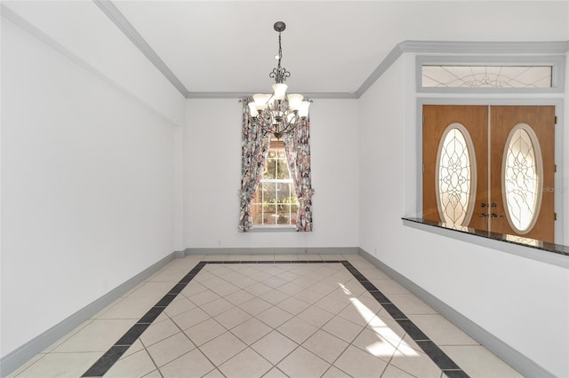 tiled spare room featuring french doors, an inviting chandelier, plenty of natural light, and crown molding