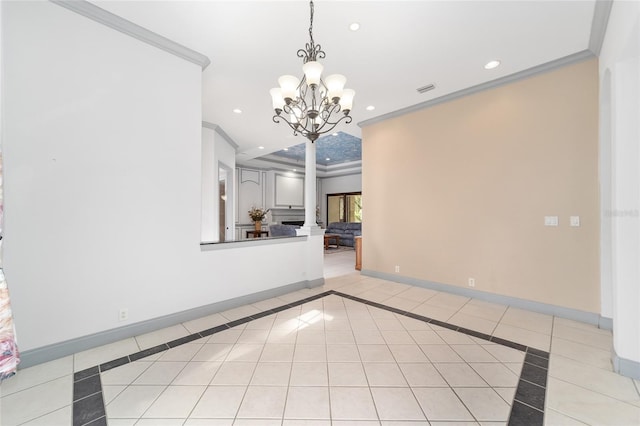 tiled empty room with an inviting chandelier and crown molding