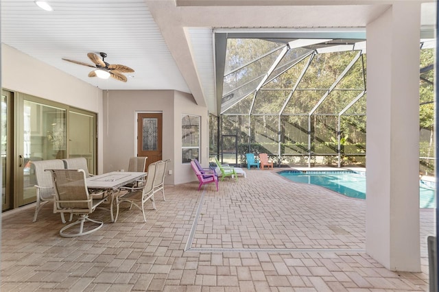 view of swimming pool with ceiling fan