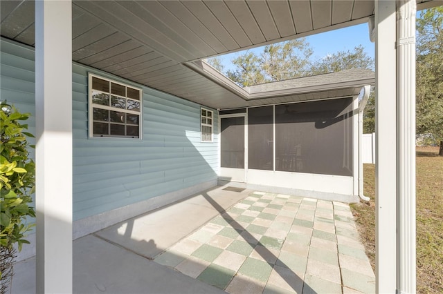 view of patio / terrace with a sunroom