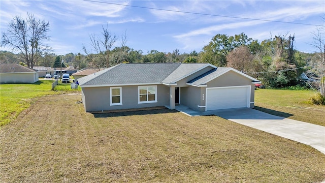 single story home featuring a front yard and a garage