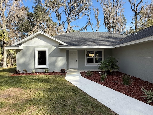 view of front of home with a front yard