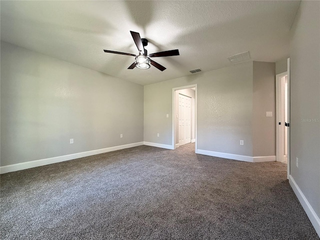 carpeted empty room with a textured ceiling and ceiling fan