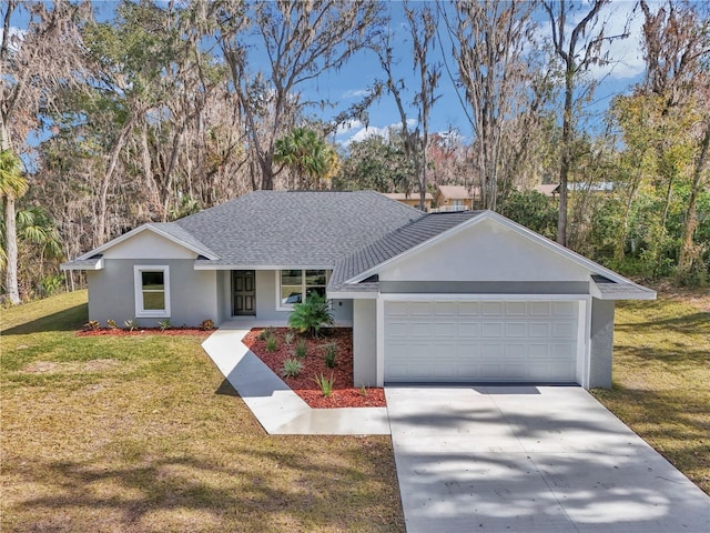 ranch-style house with a garage and a front yard