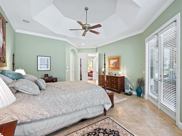 tiled bedroom featuring a tray ceiling, access to exterior, ceiling fan, and crown molding