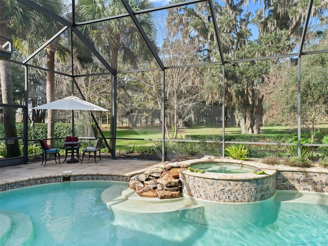 view of pool with glass enclosure, an in ground hot tub, and a patio