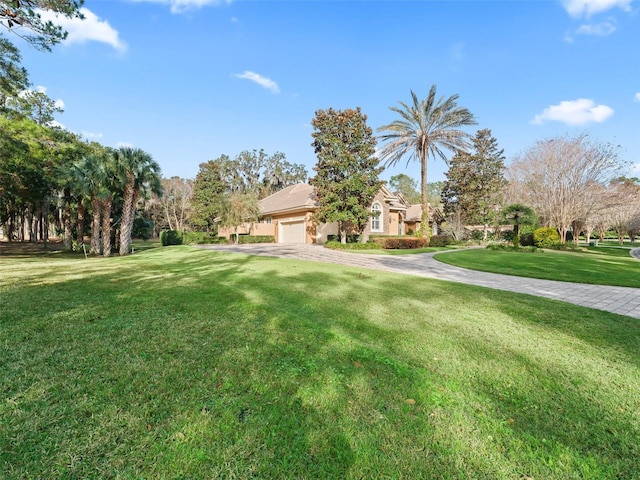 view of yard with a garage