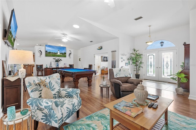 living room with ceiling fan, french doors, light wood-type flooring, and pool table