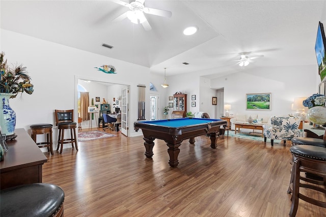 rec room featuring hardwood / wood-style floors, ceiling fan, pool table, and vaulted ceiling