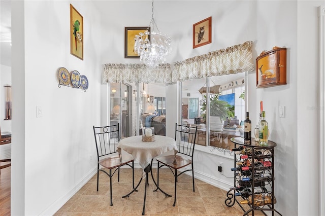 dining area with a notable chandelier