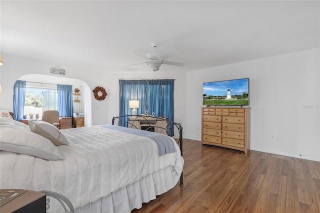 bedroom featuring ceiling fan and wood-type flooring