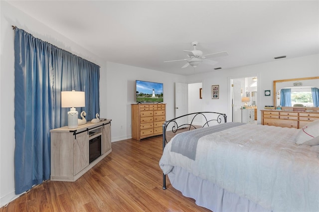 bedroom featuring ceiling fan and hardwood / wood-style floors