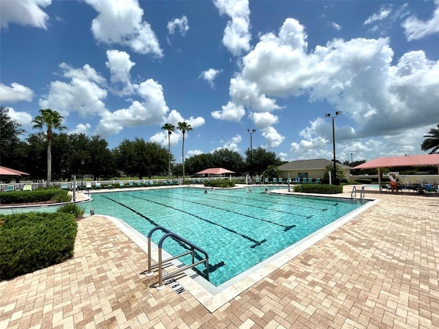 view of pool featuring a patio