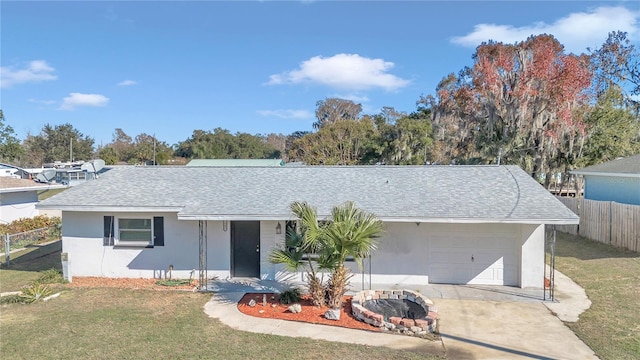 single story home with a front lawn and a garage