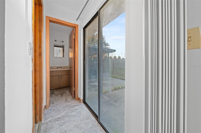 doorway featuring sink