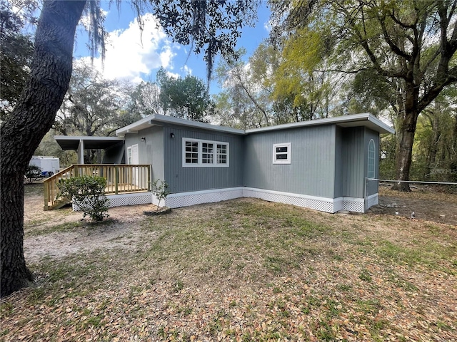 383 S Rooks Ave, Inverness, FL 34453 - exterior space featuring a deck and fence