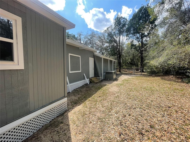 383 S Rooks Ave, Inverness, FL 34453 - view of yard featuring central air condition unit and entry steps