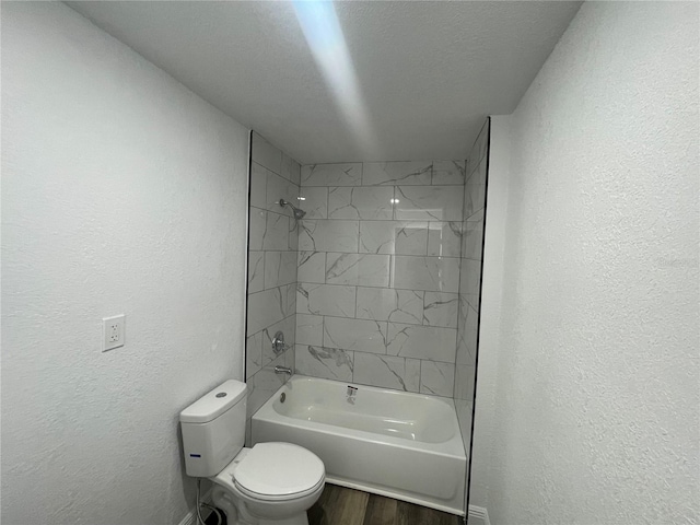 383 S Rooks Ave, Inverness, FL 34453 - bathroom with toilet, wood finished floors, a textured wall, and a textured ceiling