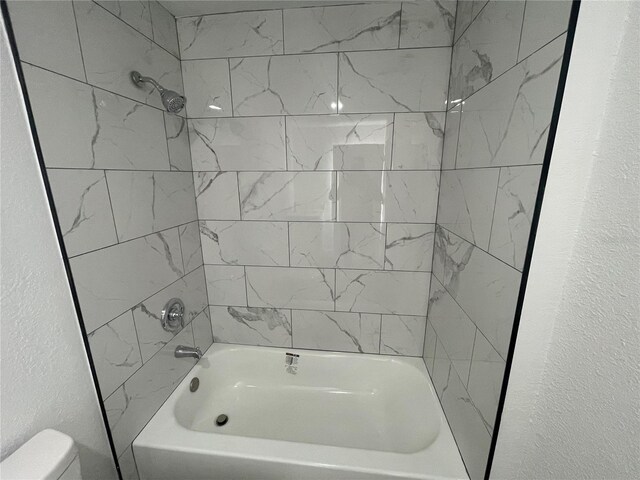 383 S Rooks Ave, Inverness, FL 34453 - full bath with toilet, shower / bathing tub combination, and a textured wall